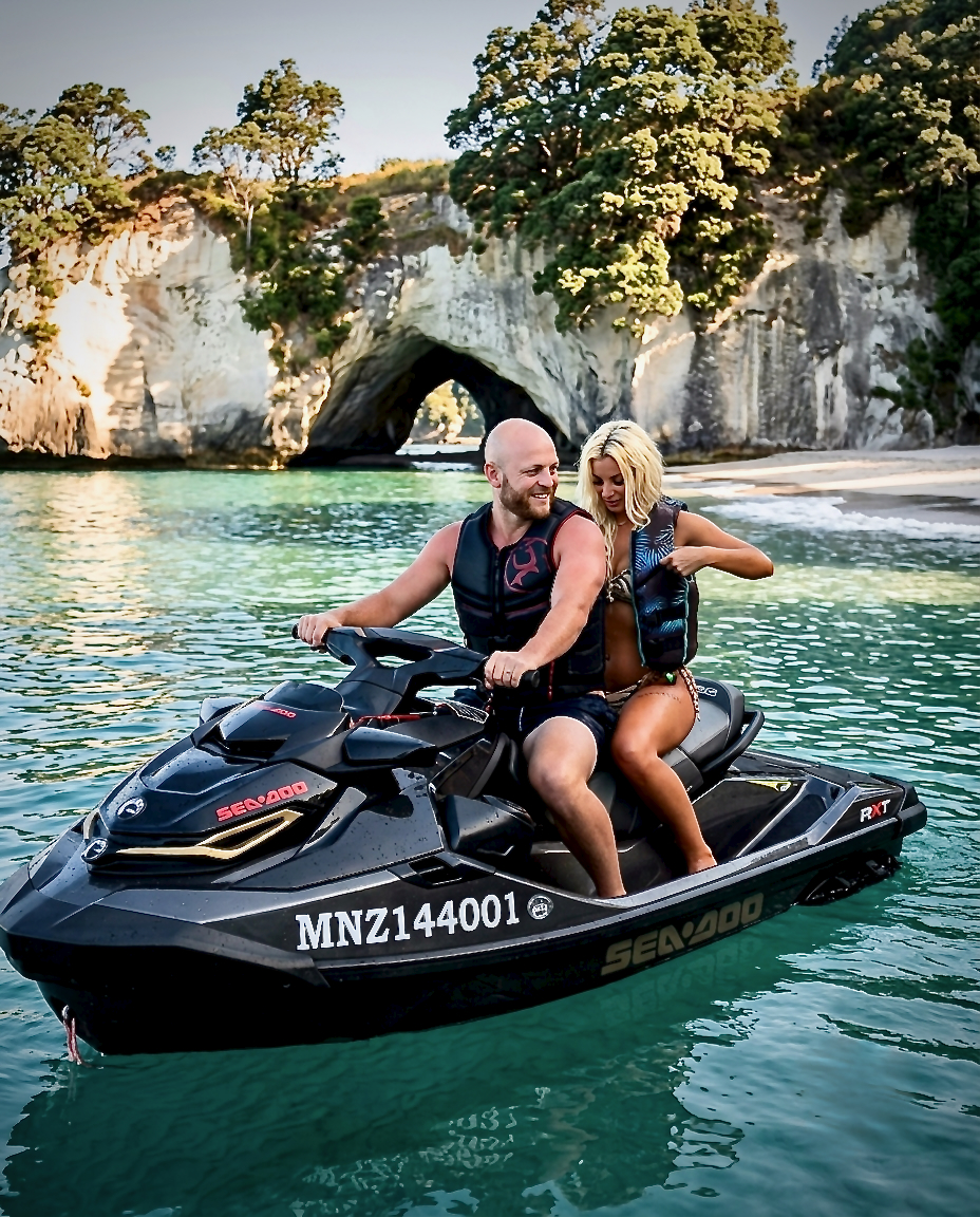 Riders on a Sea-Doo RXT in front of Cathedral Cove